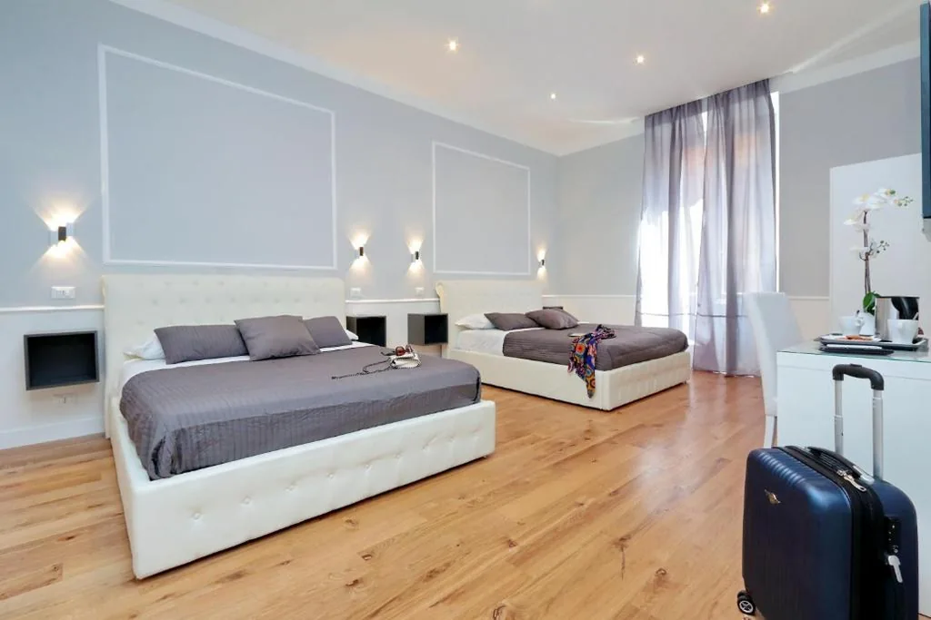 Camera Quadrupla Deluxe con Bagno Privato — St. Peter Vatican Rooms