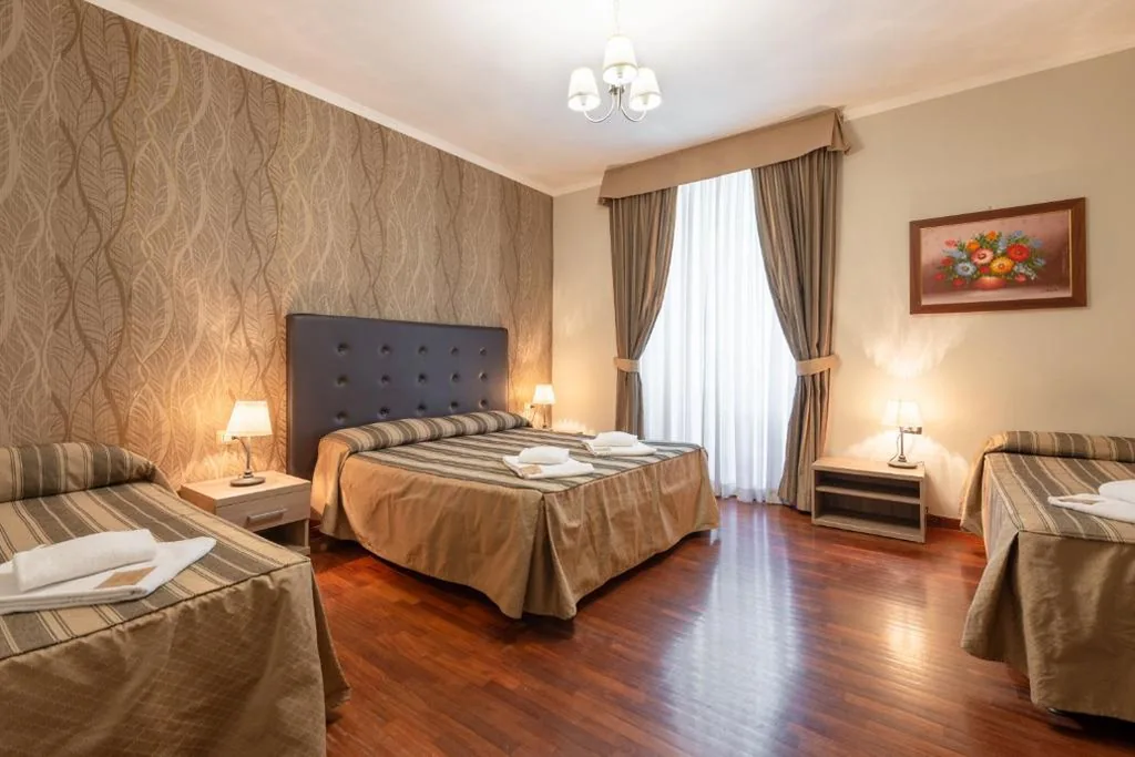 Camera Quadrupla Deluxe — Dreams Roma B&B
