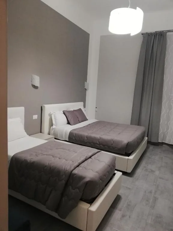 Deluxe Quadruple Room — Garden’s Elide