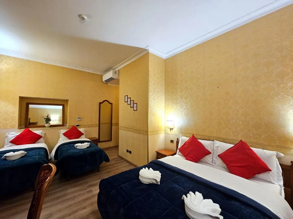 Camera Quadrupla Deluxe — Hotel Amadeus