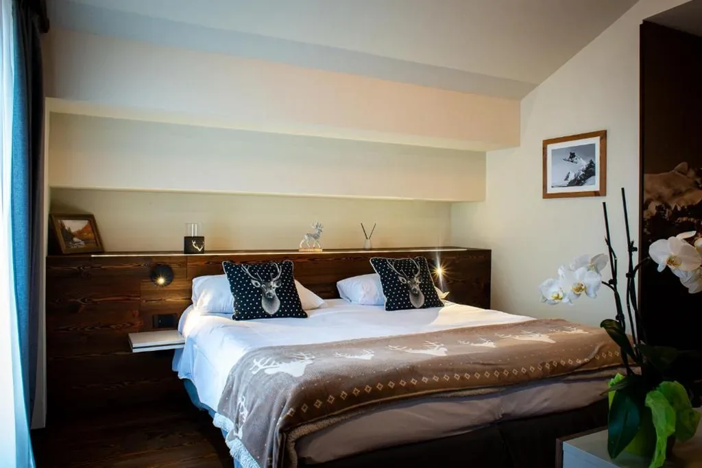 Deluxe Quadruple Room — Hotel De Champoluc