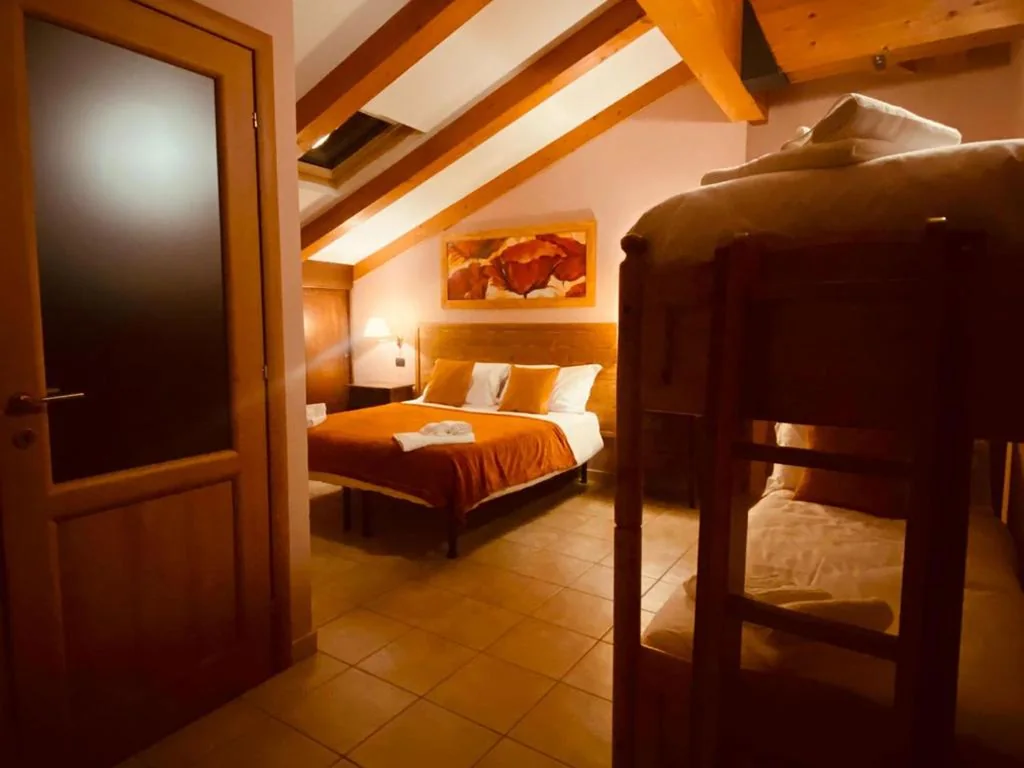 Deluxe Quadruple Room — Hotel Lion