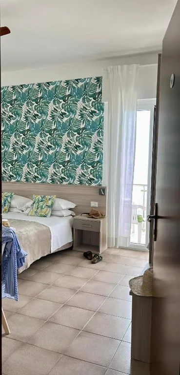 Deluxe Quadruple Room — Hotel Maremola