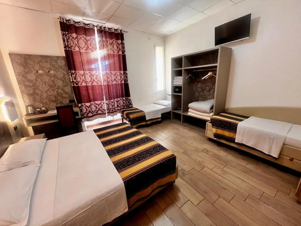 Deluxe Quadruple Room — Hotel principe