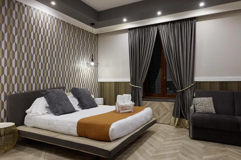 Camera Quadrupla Deluxe — Hotel Roma Vaticano