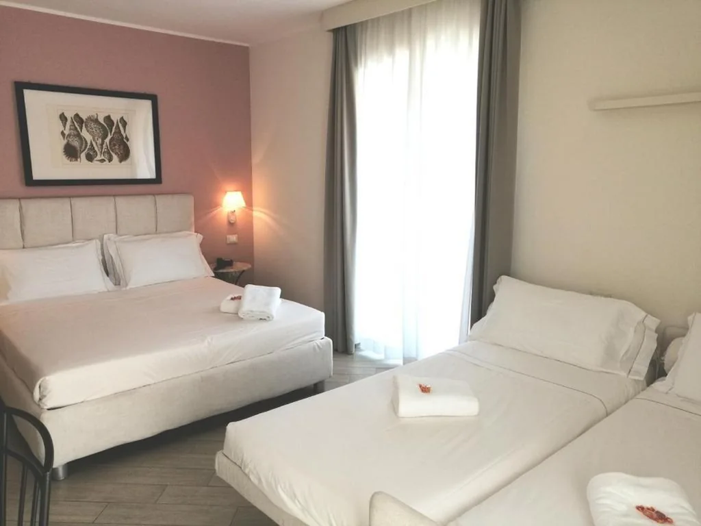 Camera Quadrupla Deluxe — Hotel San Pietro Palace