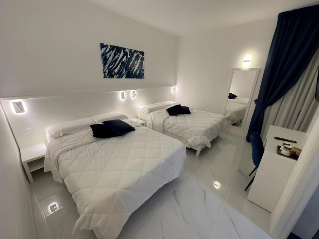 Camera Quadrupla Deluxe — Hotel Smart Cruise