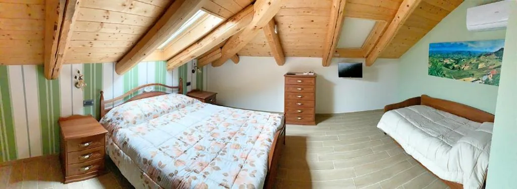 Deluxe Quadruple Room — Il Bambuseto