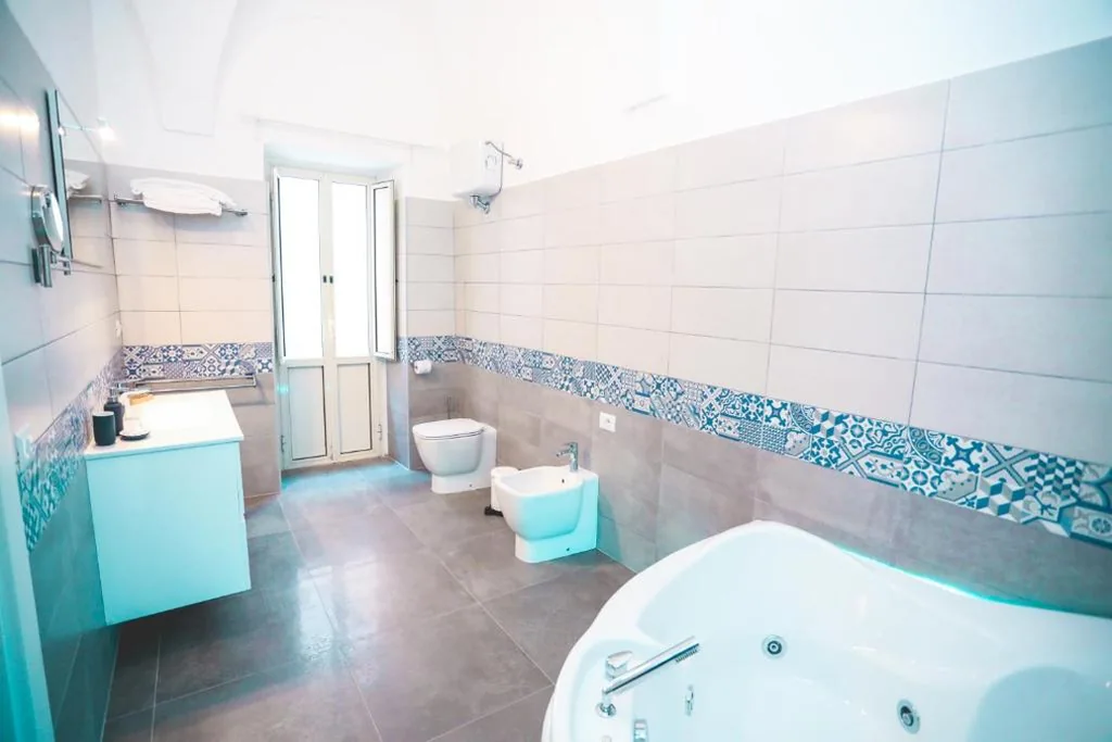 Deluxe Quadruple Room — IL VIAGGIATORE VIA INDIPENDENZA 2