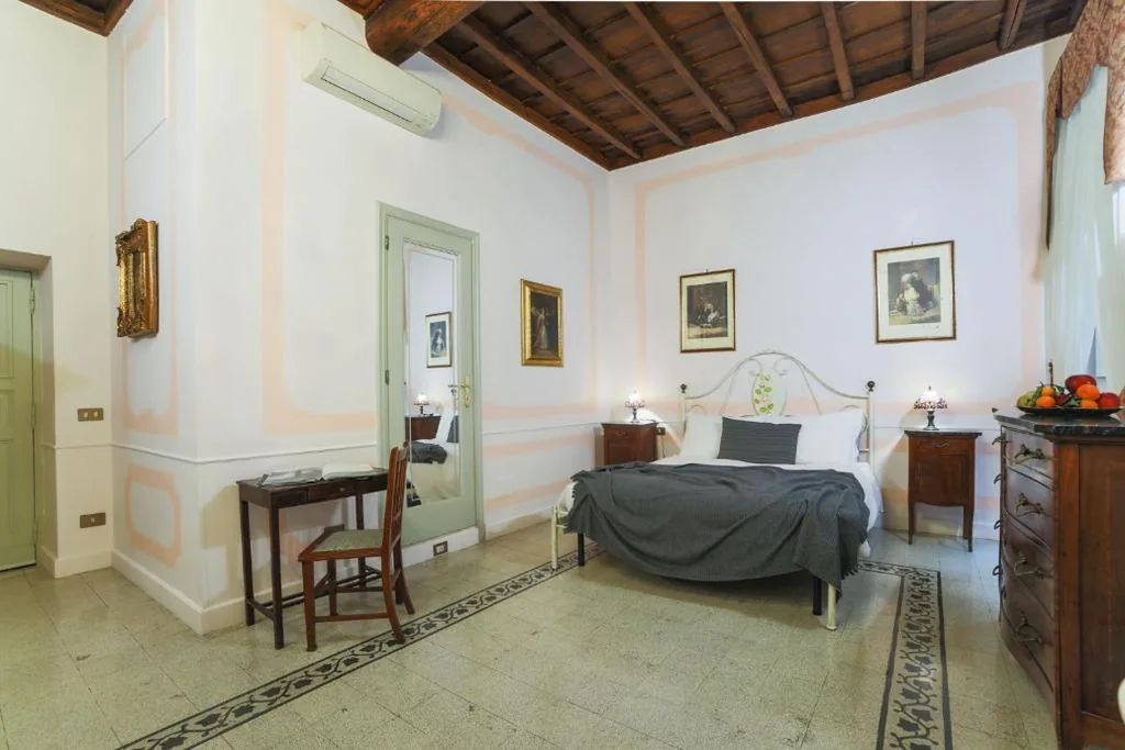 Deluxe Quadruple Room — La Maison Dell’Orologio