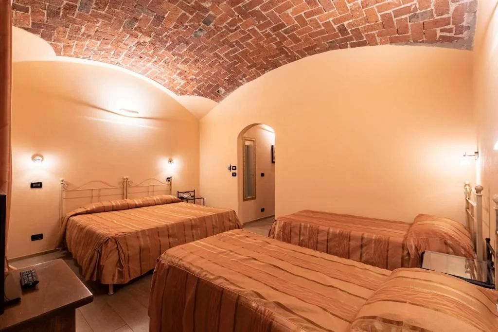 Deluxe Quadruple Room — Le Lanterne