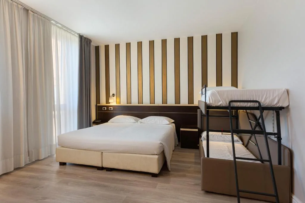 Camera Quadrupla Deluxe — LVG Hotel Collection – Al Mulino