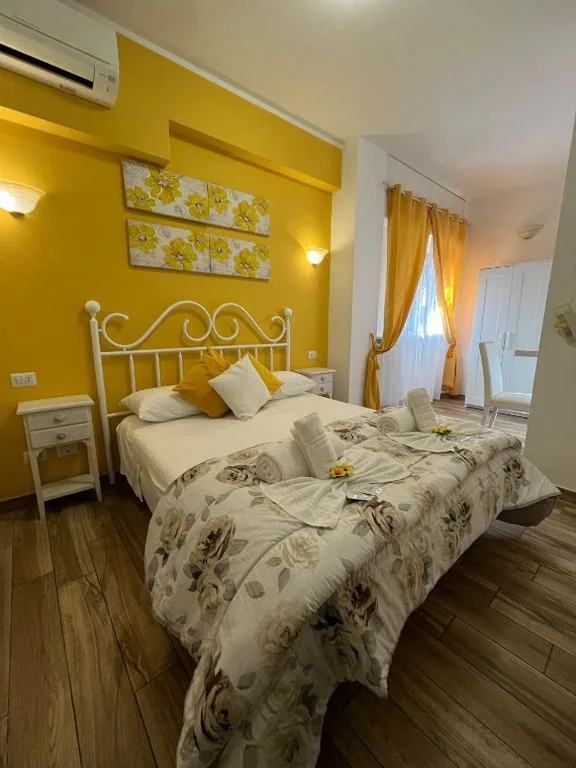 Deluxe Quadruple Room — Paganino rooms