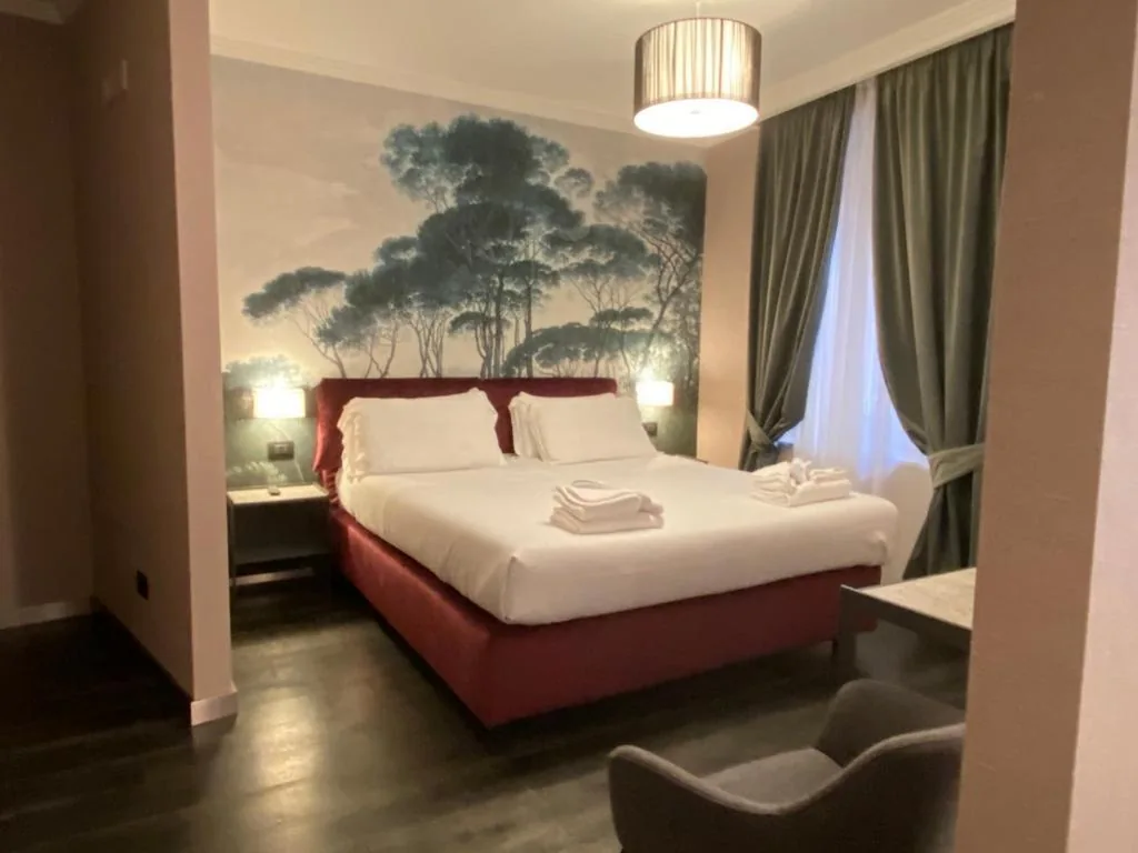 Camera Quadrupla Deluxe — PAX hotel