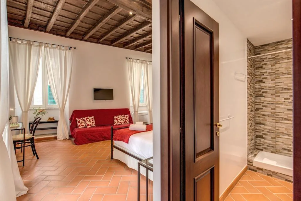 Camera Quadrupla Deluxe — Piccolo Trevi Suites