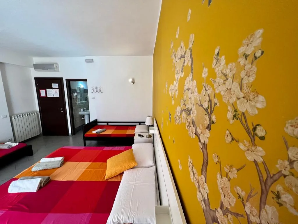 Deluxe Quadruple Room — Residenza Cerci