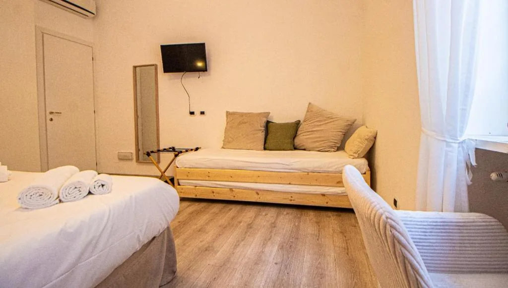 Deluxe Quadruple Room — RHome 34