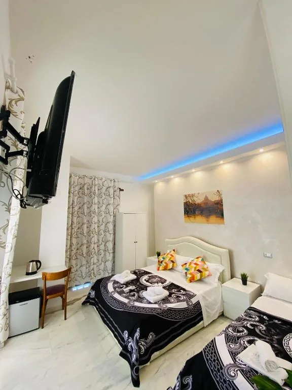 Deluxe Quadruple Room — Santa Maria Accommodation