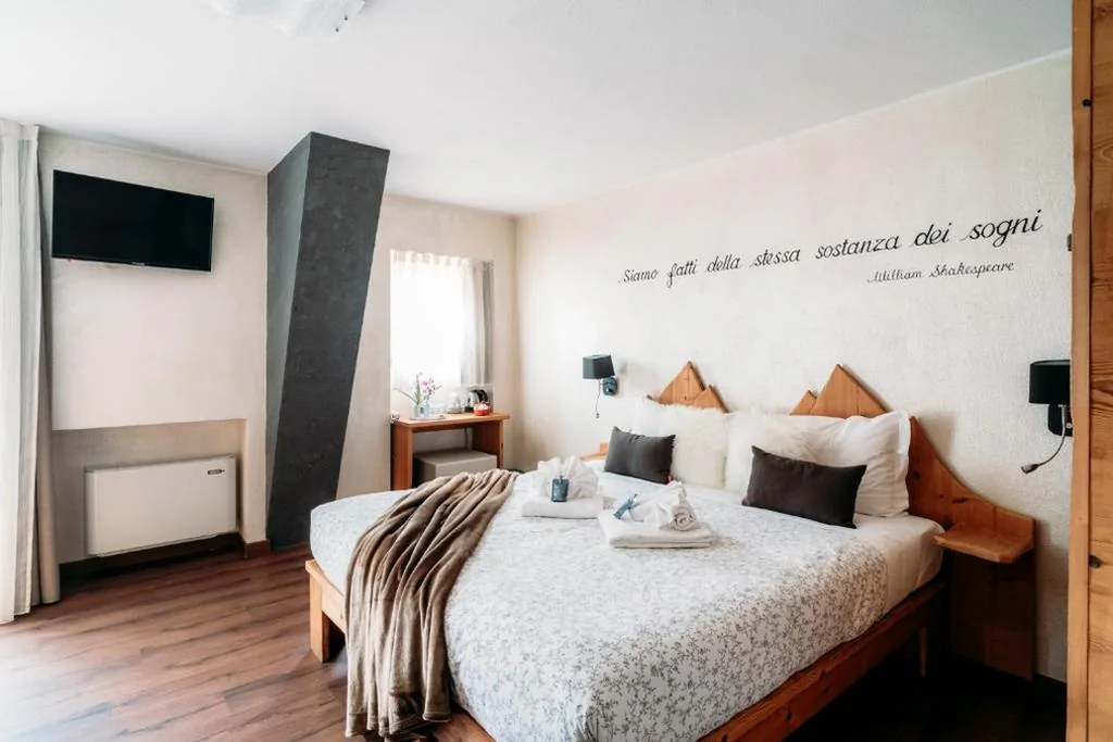 Camera Quadrupla Deluxe — Serendipity Hotel