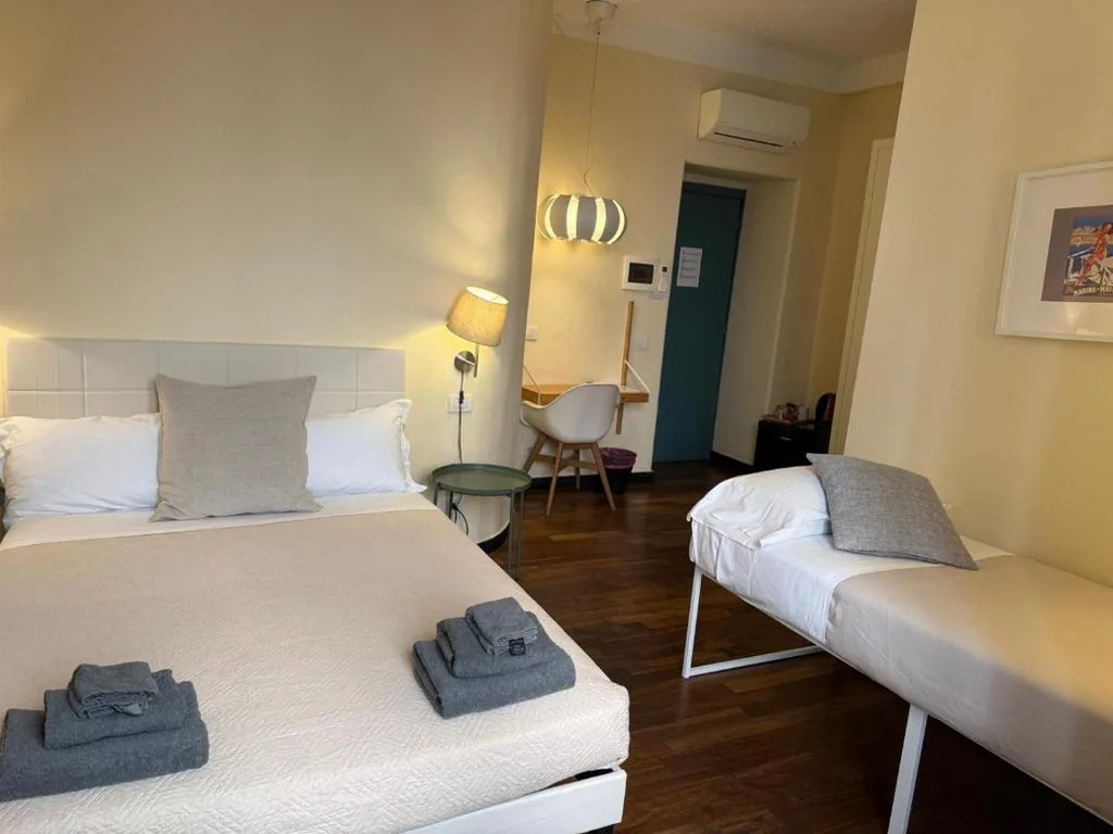 Camera Quadrupla Economy — Guest House City Center Fazio