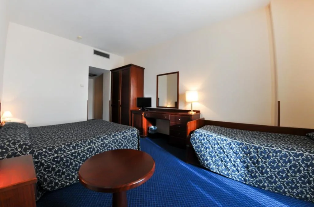 Camera Quadrupla Economy — Hotel Mediterraneo