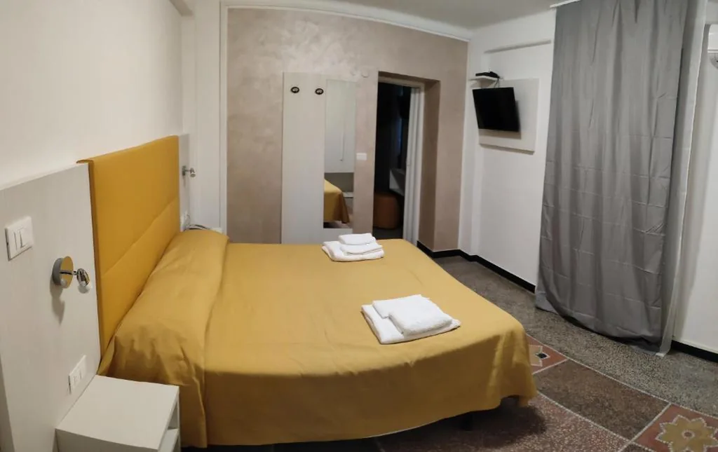 Camera Quadrupla Economy — Hotel Villa Costa