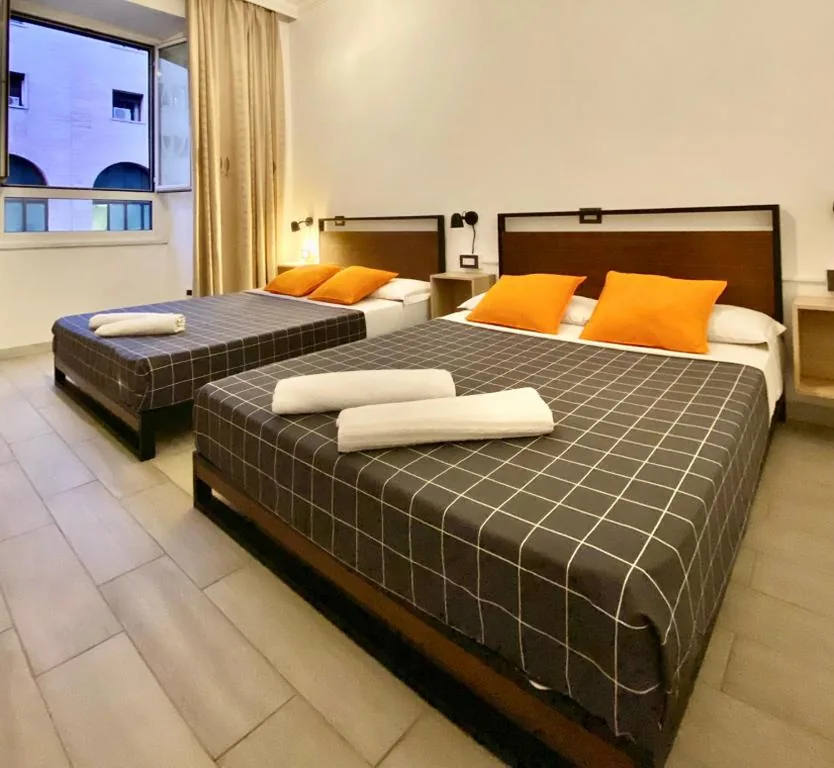 Quadruple Economy Room — Overseas Guesthouse