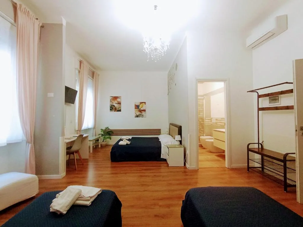 Quadruple Room — El Dorado Prati