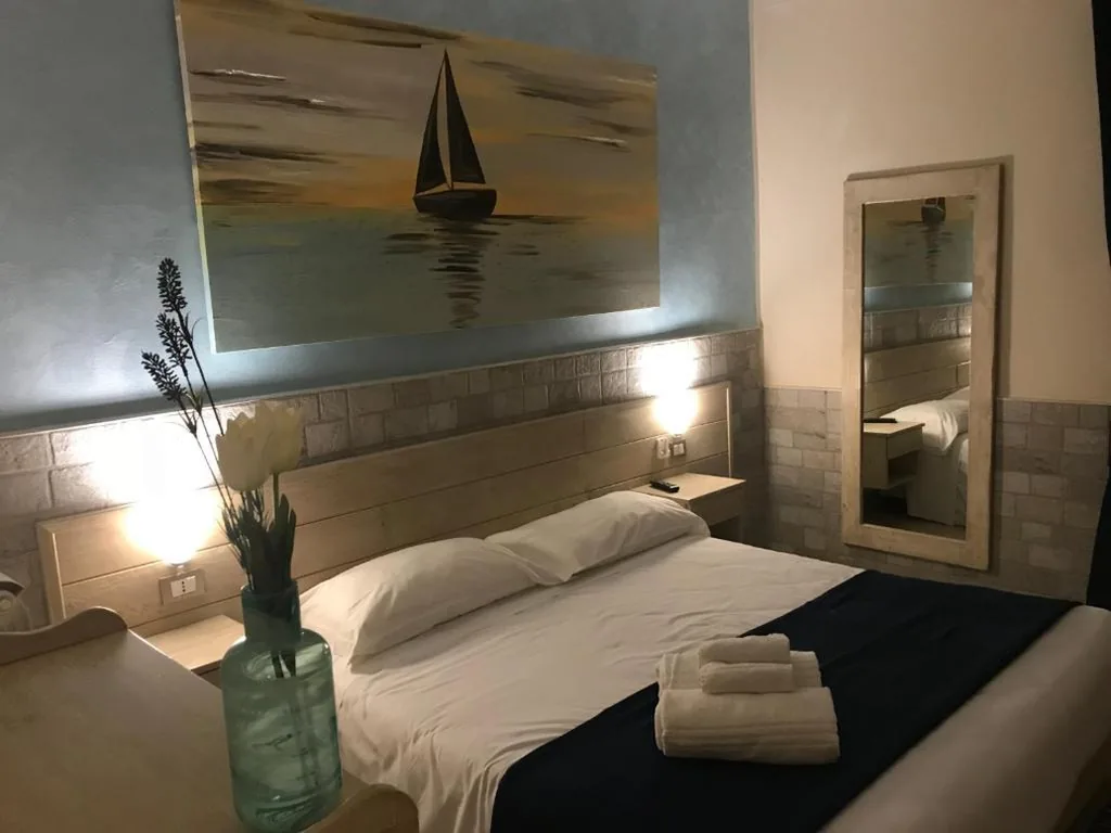 Camera Quadrupla — Fiumicino Airport B&B Deluxe