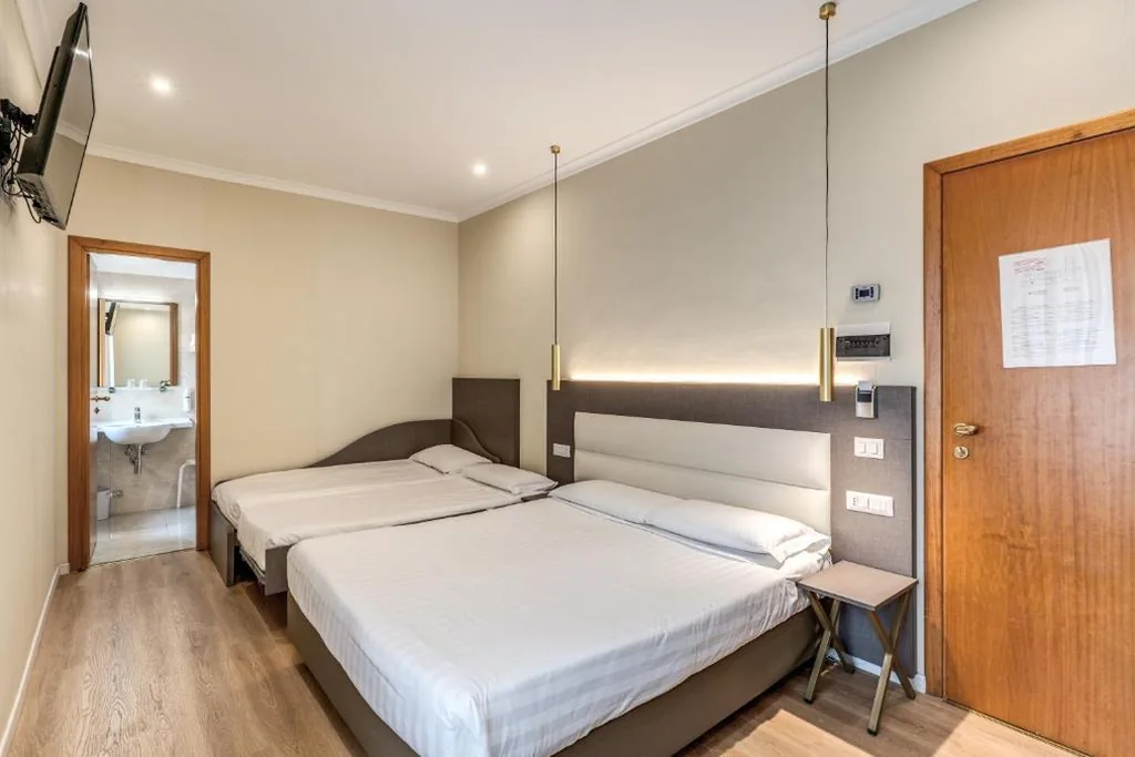 Quadruple Room — Flower Garden Hotel