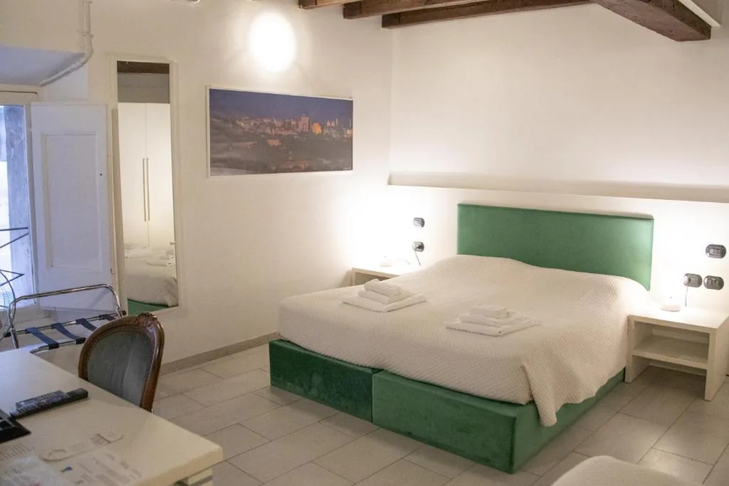 Quadruple Room — Flowers Apartments Rome City Center