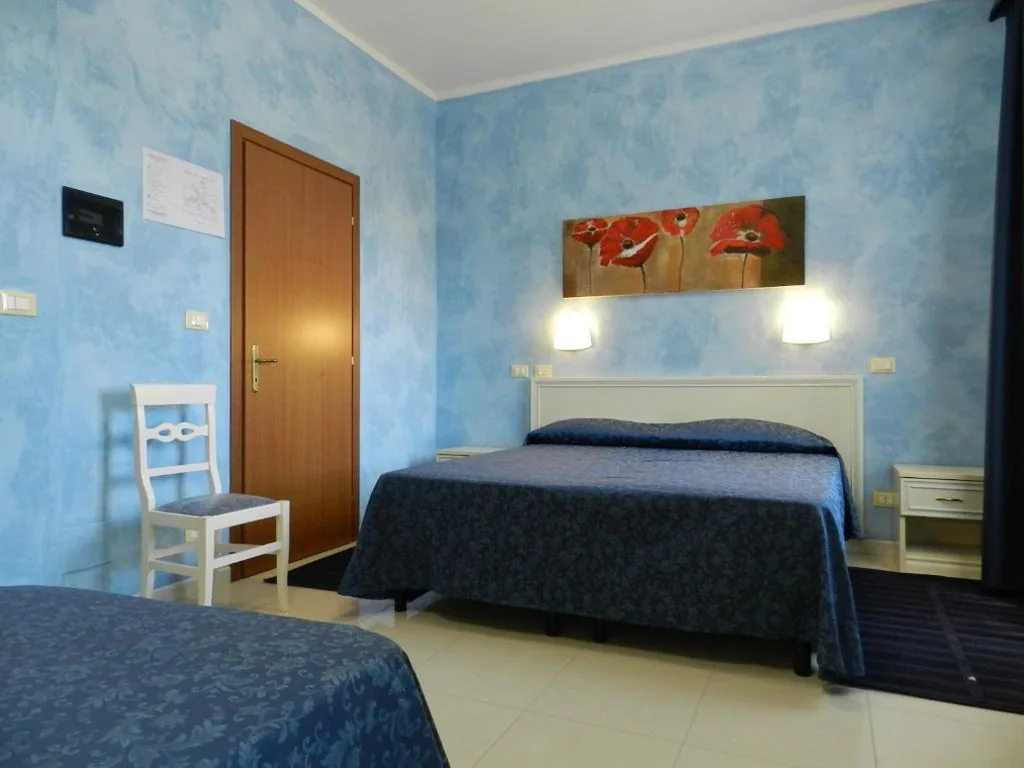Quadruple Room — Hotel Air Palace Lingotto