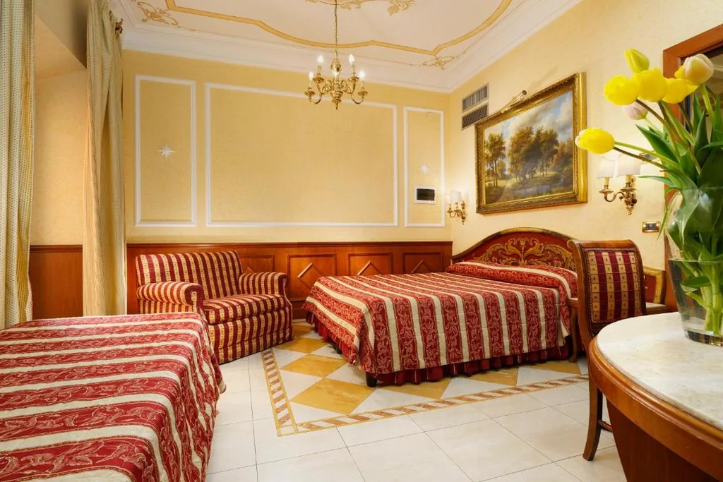 Camera Quadrupla — Hotel Bolivar