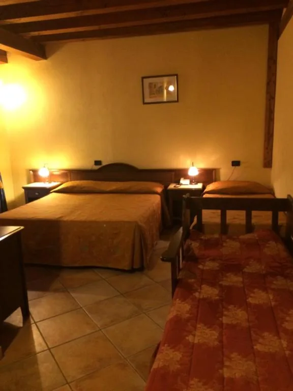 Quadruple Room — Hotel Cà Fiore