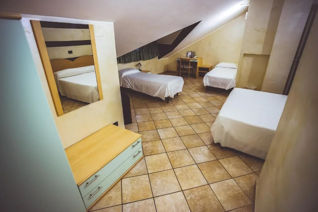 Quadruple Room — Hotel City