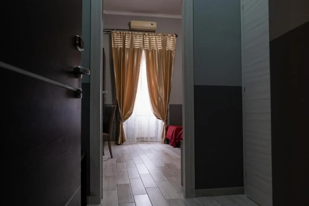 Quadruple Room — Hotel d’Este