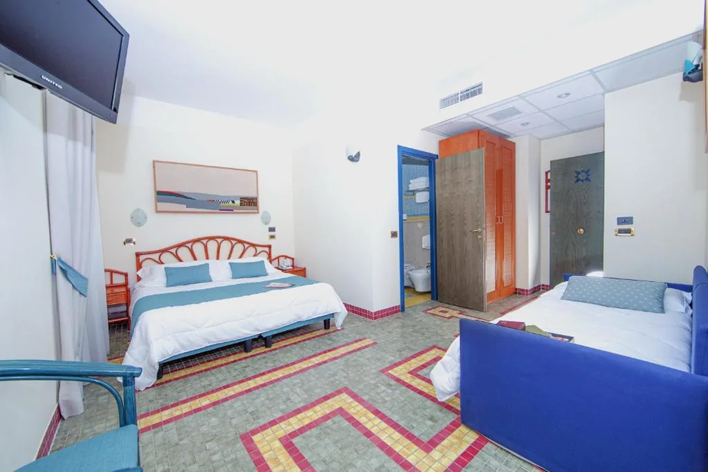 Quadruple Room — Hotel Della Baia