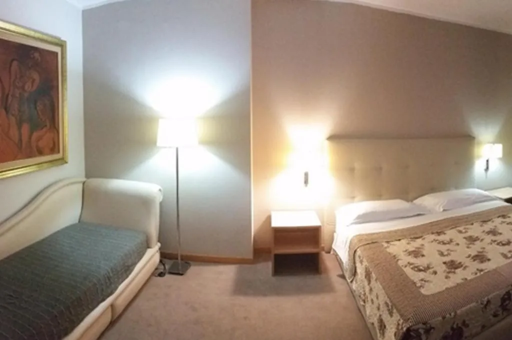 Quadruple Room — Hotel Desiderio
