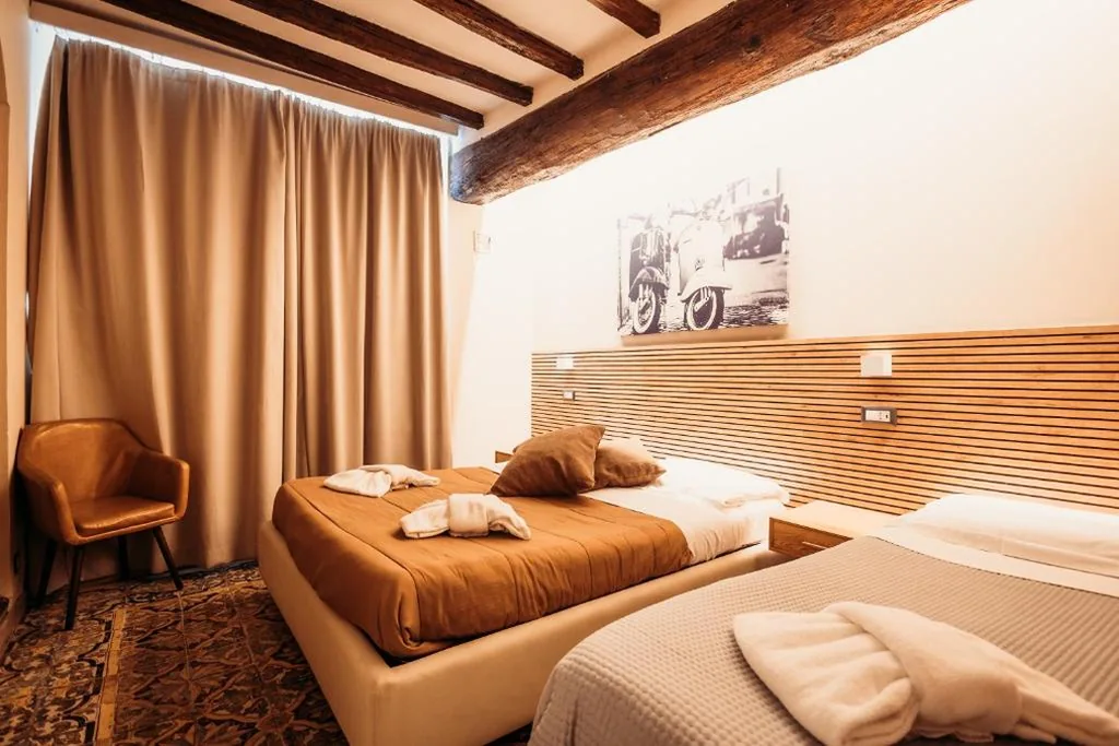 Quadruple Room — Hotel Domus Tiberina