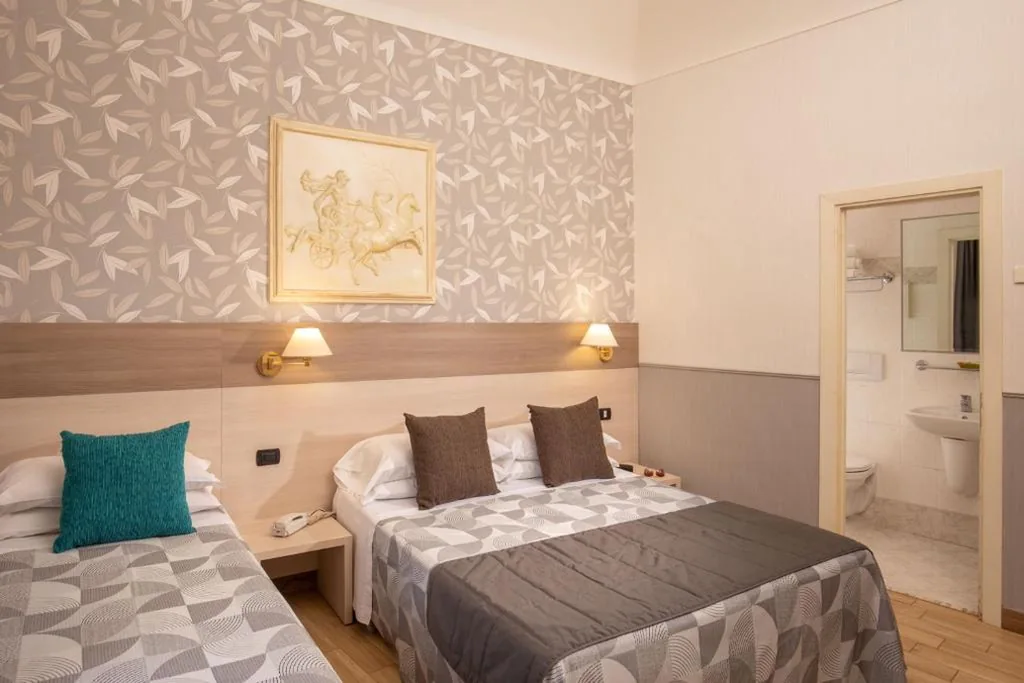 Quadruple Room — Hotel Dorica