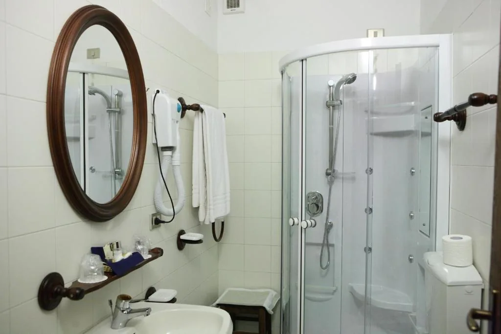 Quadruple Room — Hotel Edelweiss & SPA