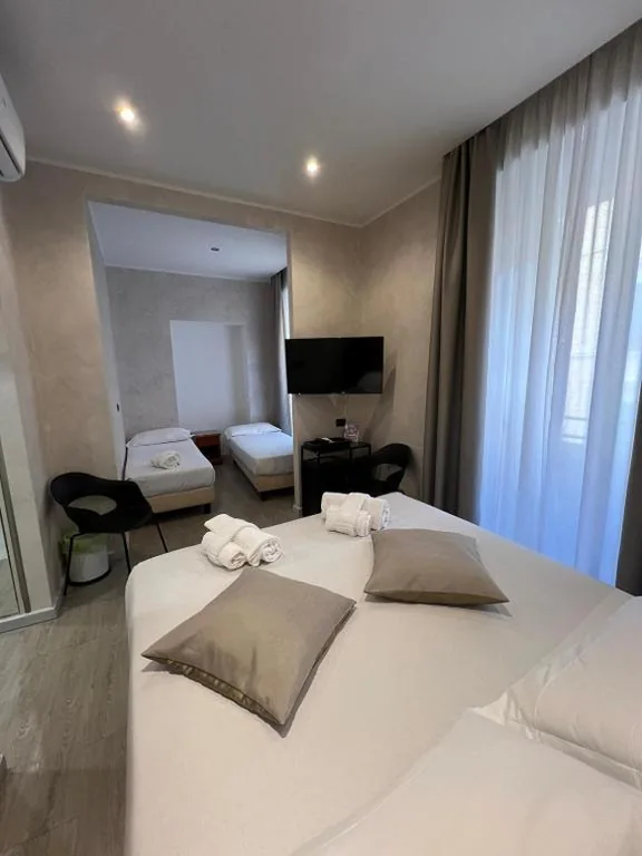 Quadruple Room — Hotel Ercoli House