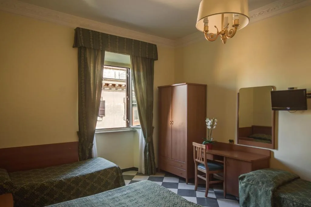 Quadruple Room — Hotel Giorgina