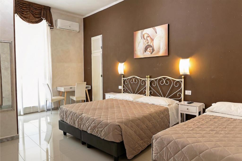Quadruple Room — Hotel Giugiù