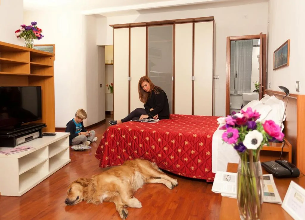 Quadruple Room — Hotel Helvetia