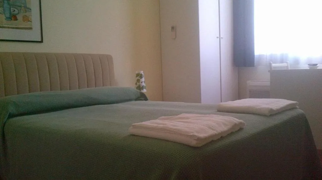 Quadruple Room — Hotel Le Grazie
