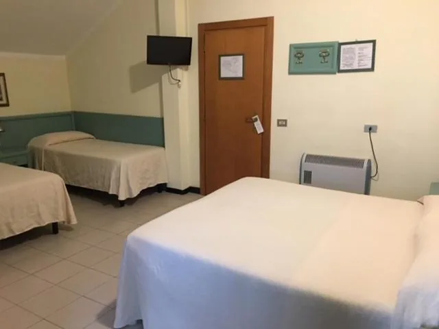 Quadruple Room — Hotel Marina