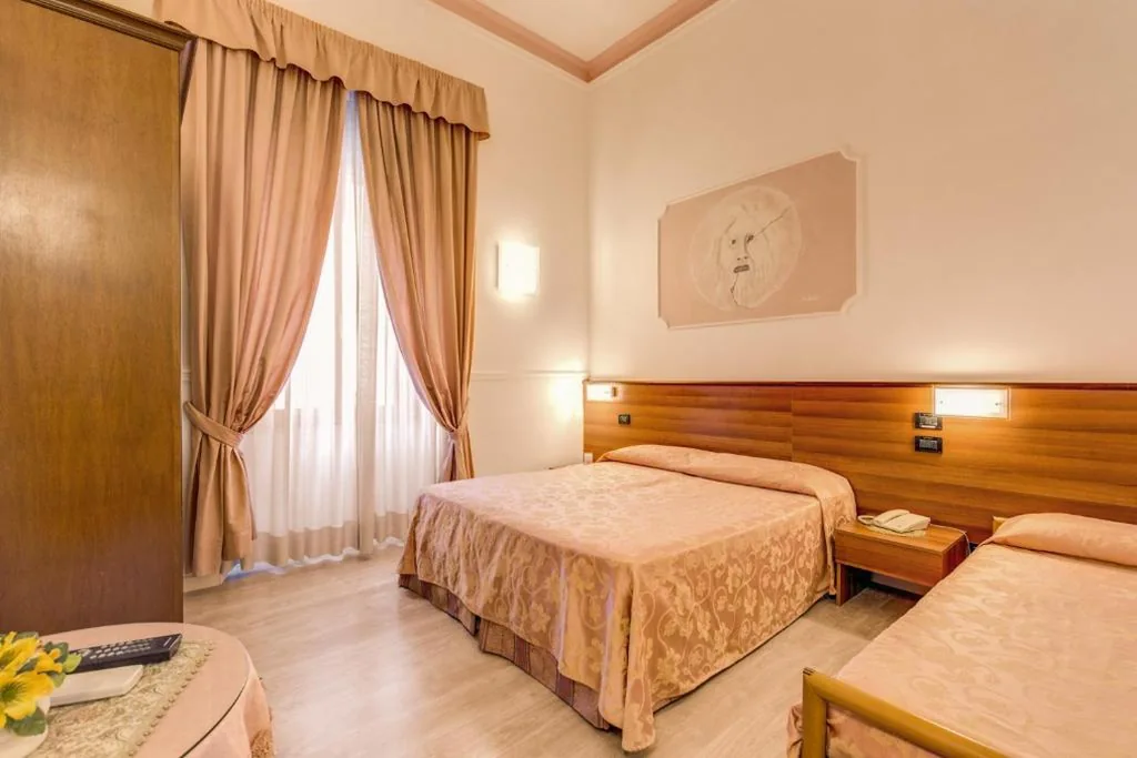 Quadruple Room — Hotel Martini