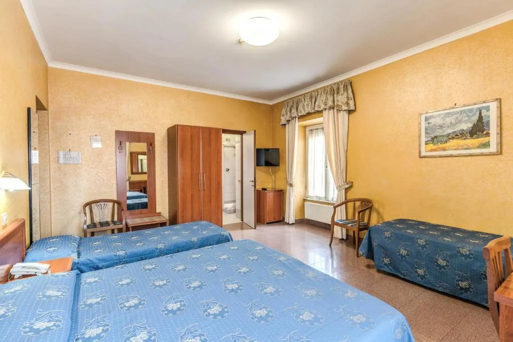 Quadruple Room — Hotel Milo