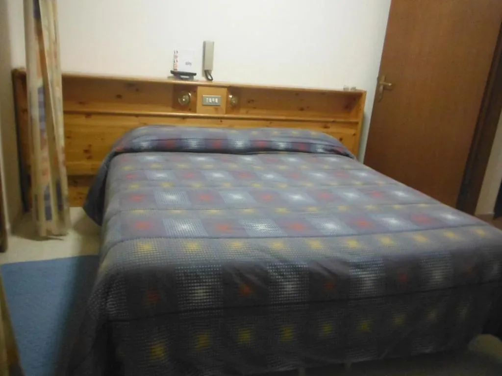 Quadruple Room — Hotel Mochettaz